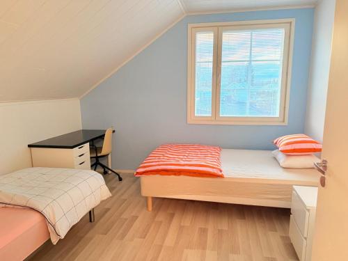 Postel nebo postele na pokoji v ubytování Stylish and Spacious House in Vantaa