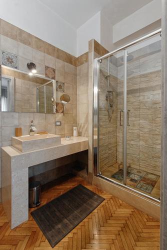 a bathroom with a sink and a shower at Central Apt with Pool exclusive use in Brindisi
