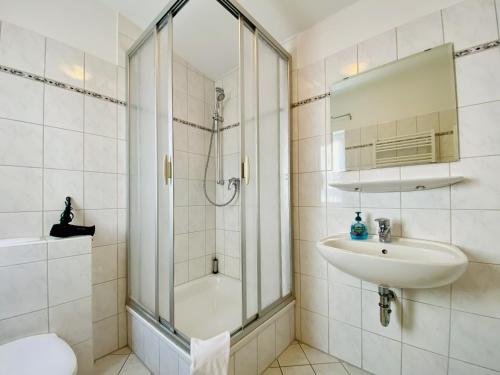 Ένα μπάνιο στο Villa Fortuna Gästehaus App Fehmarn