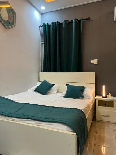 Postel nebo postele na pokoji v ubytování Tataicha Stydio 1