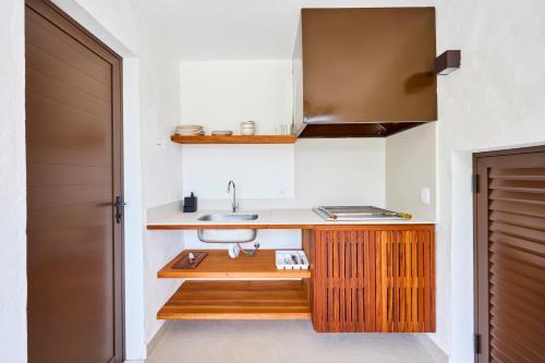 Køkken eller tekøkken på Villa da Barra Ubatuba