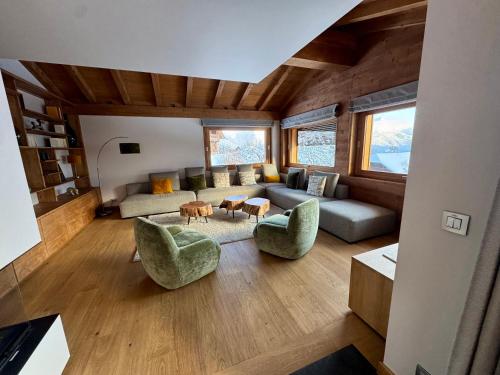 Posezení v ubytování Chalet du Feug