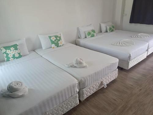 Ένα ή περισσότερα κρεβάτια σε δωμάτιο στο Comfy Hotels Suvarnabhumi Airport