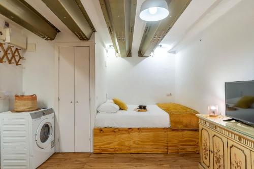 Giường trong phòng chung tại 2537 - AB Sant Antoni Studio