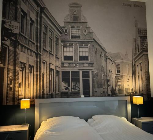 Ένα ή περισσότερα κρεβάτια σε δωμάτιο στο In de Kathoek - Beste voorwaarden via eigen kanaal