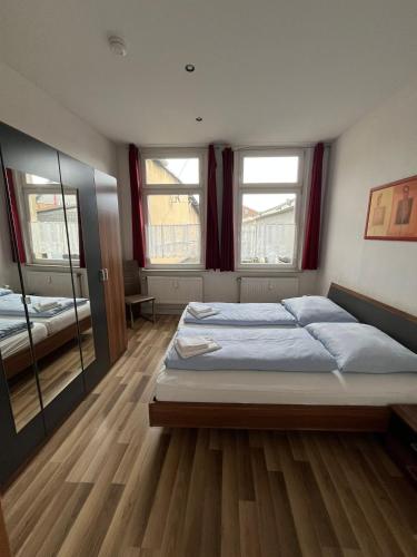 Postel nebo postele na pokoji v ubytování Ferienwohnung am Liebesgrund