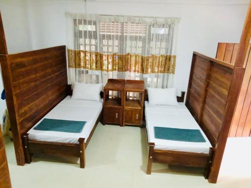 Postel nebo postele na pokoji v ubytování Ella nature hostel