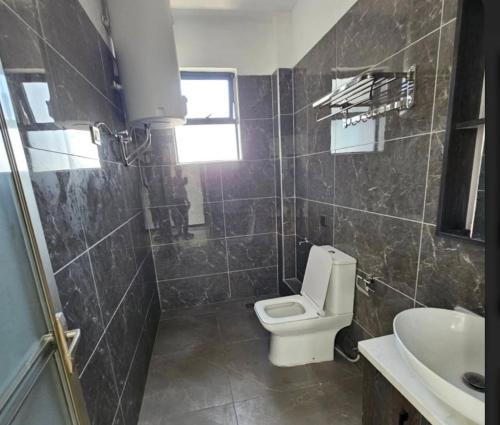 Koupelna v ubytování EasyStay