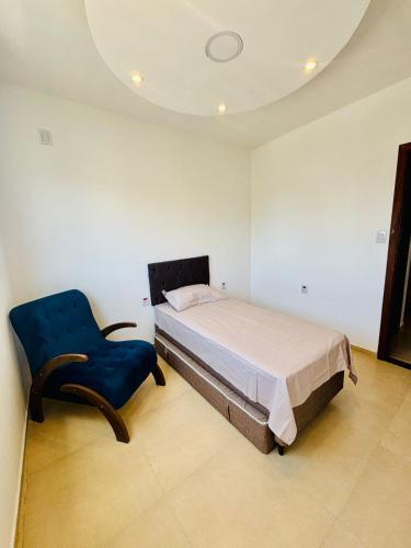 En eller flere senge i et værelse på Rio grande apartamento Silva paes 374