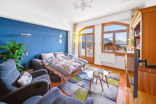 Χώρος καθιστικού στο Appartement 2 à 4 personnes au centre du village