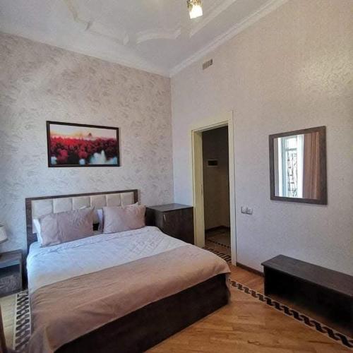 Llit o llits en una habitació de Soprano Guest House