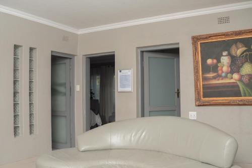 Ein Sitzbereich in der Unterkunft Sandown Suites and Conference Centre