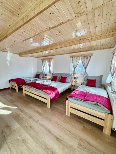 Postel nebo postele na pokoji v ubytování Apartmány u náměstí