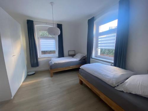 Postel nebo postele na pokoji v ubytování Ferienwohnung Fam. Falk
