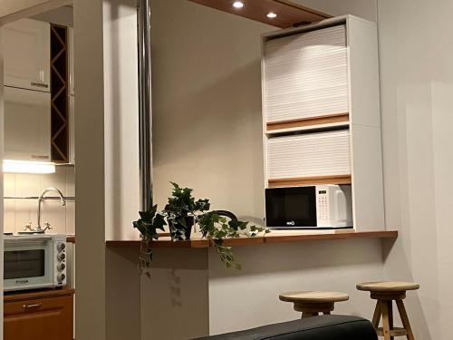 Kuchyň nebo kuchyňský kout v ubytování Beautiful studio with balcony near Old Rauma