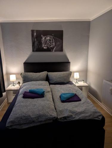 Ένα ή περισσότερα κρεβάτια σε δωμάτιο στο Stadtnah an der Förde 7 HH L 1OG