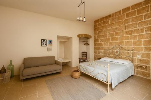 Postel nebo postele na pokoji v ubytování B&B Corte San Giorgio