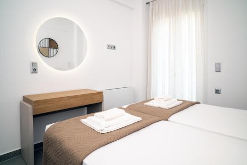 Postel nebo postele na pokoji v ubytování Naiada Apartments
