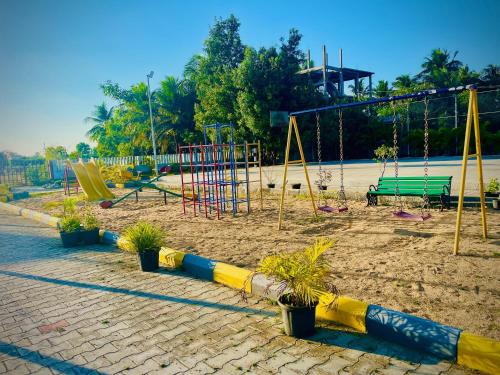 Fotografie z fotogalerie ubytování Gatorgetaway inn v destinaci Tirupporūr