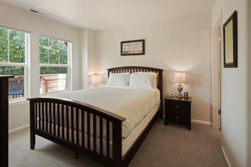 a bedroom with a large bed and a window at Old Mill Magic in Bend