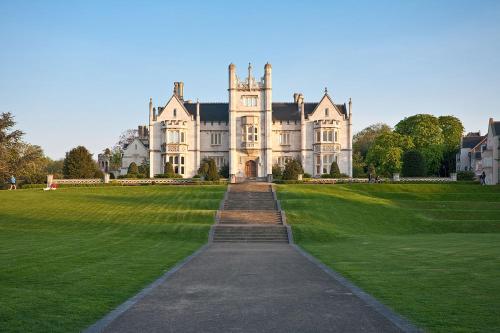 a large castle with a pathway in the grass at Thames River Side in Stonewood