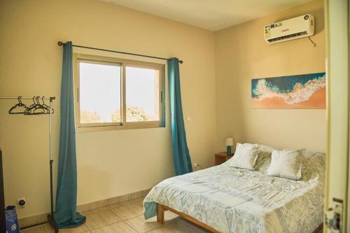 Voodi või voodid majutusasutuse Le 4ème Ciel Appart Cosy et Équipé Wifi 2TV toas