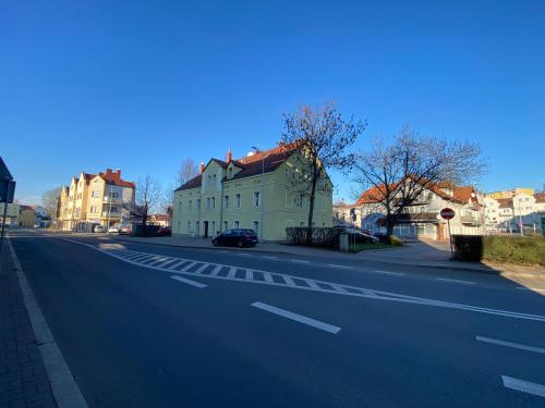 a house on the side of a street at MIESZKANIE APRTEMNT DO WYNAJECIA na doby Bolesławiec in Bolesławiec