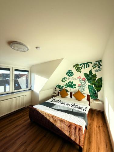 a bedroom with a bed in a room at Bachhaus am Rathaus 3 in Emden