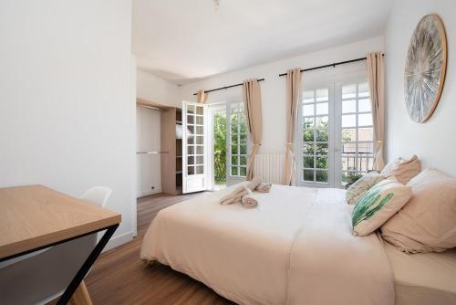 Ένα ή περισσότερα κρεβάτια σε δωμάτιο στο Maison design