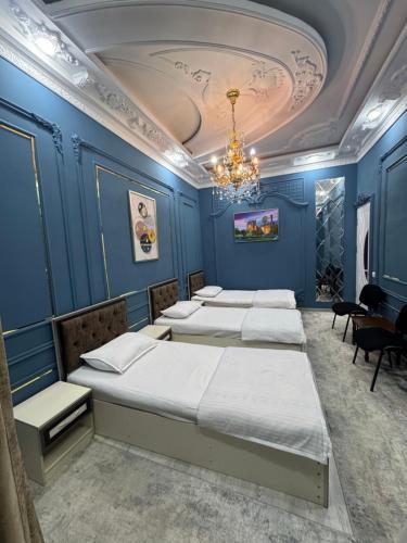 Ένα ή περισσότερα κρεβάτια σε δωμάτιο στο Abubakir Guests House