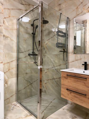 Et badeværelse på Rumia Apartment by JumpInHere