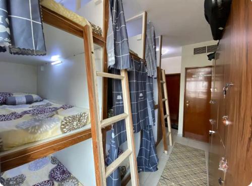 Postel nebo postele na pokoji v ubytování Holiday Homes