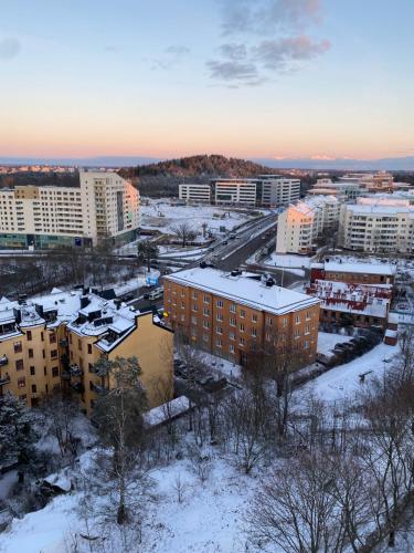 an aerial view of a city in the snow at Wesfield Private in Solna