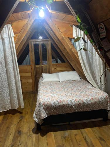 Voodi või voodid majutusasutuse Cabaña Cumanday toas