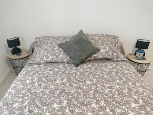 Postel nebo postele na pokoji v ubytování La Trimouillaise