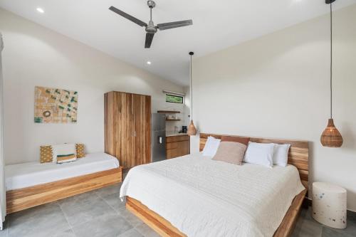 Ένα ή περισσότερα κρεβάτια σε δωμάτιο στο Villas Vivo