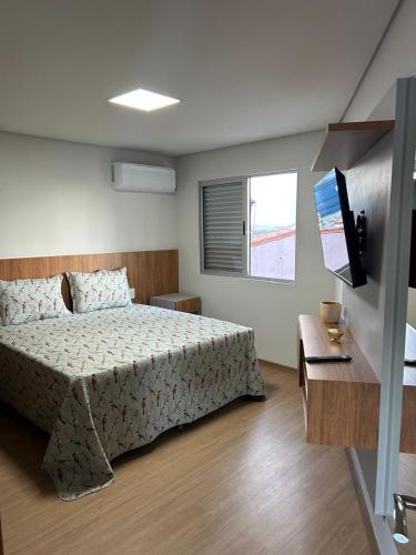 Postel nebo postele na pokoji v ubytování Kitnet em cobertura Bom Despacho-MG