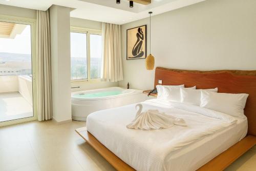 Ένα ή περισσότερα κρεβάτια σε δωμάτιο στο ONE GATE Pyramids View INN