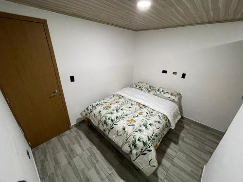 Ένα ή περισσότερα κρεβάτια σε δωμάτιο στο La Casa de Esteban