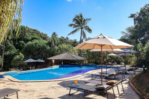 Πισίνα στο ή κοντά στο Apartamento Girassóis com 2 suites- Summer Hospedagem