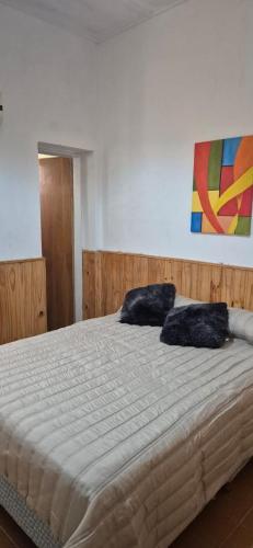 Postel nebo postele na pokoji v ubytování Residencial La Familia