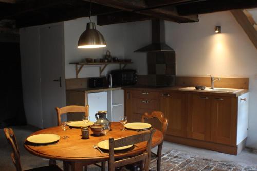 Kuchyň nebo kuchyňský kout v ubytování Le loft du Totem