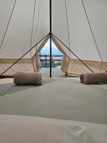 Postel nebo postele na pokoji v ubytování Au coeur des plantations