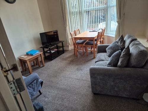 Χώρος καθιστικού στο Harrogate central apartment