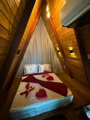 Postel nebo postele na pokoji v ubytování Chalés Mirante da Serra PB