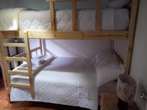 Ένα ή περισσότερα κρεβάτια σε δωμάτιο στο Casa del cielo