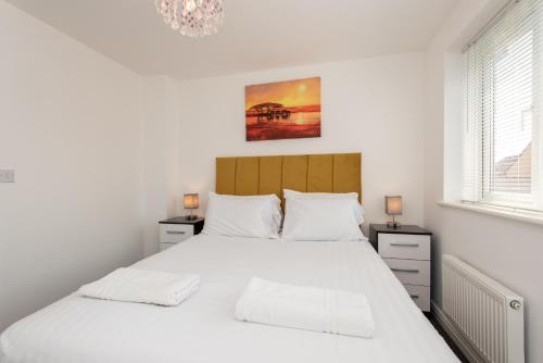 En eller flere senge i et værelse på Thinford View 4 bed, 2bath, Parking, Garage