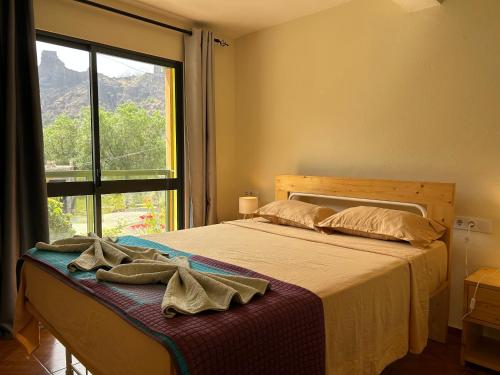 Ένα ή περισσότερα κρεβάτια σε δωμάτιο στο Casa Manuel & Elvira