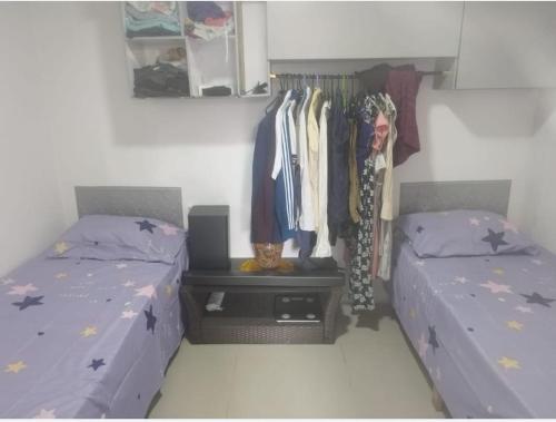 Ένα ή περισσότερα κρεβάτια σε δωμάτιο στο Apartaestudio amoblado PIMSA