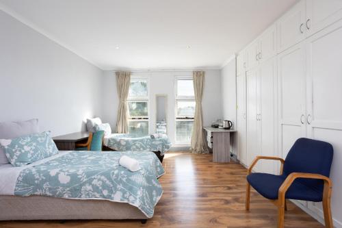 Postel nebo postele na pokoji v ubytování 6 Crawford Road, Rondebosch East